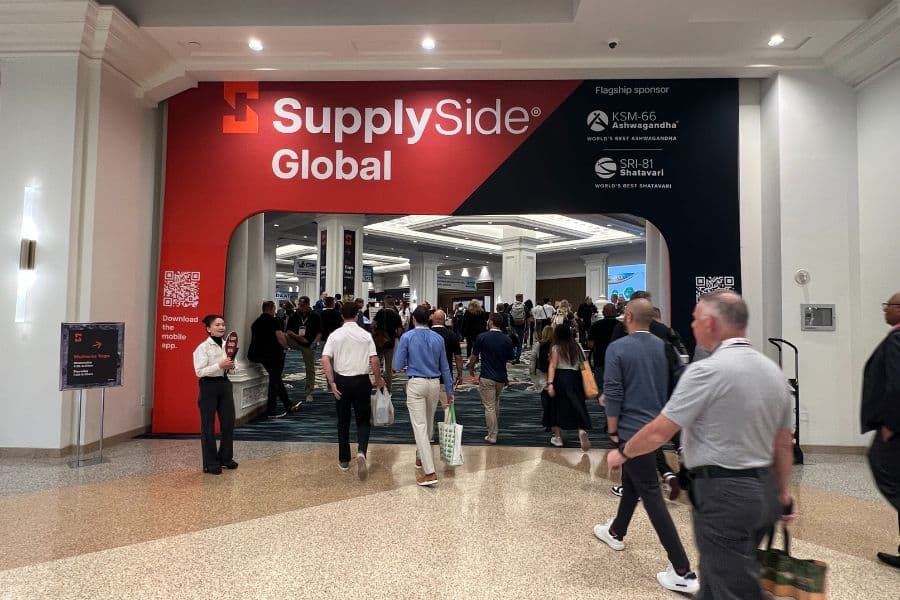 Attendees enter the SupplySide Global expo hall