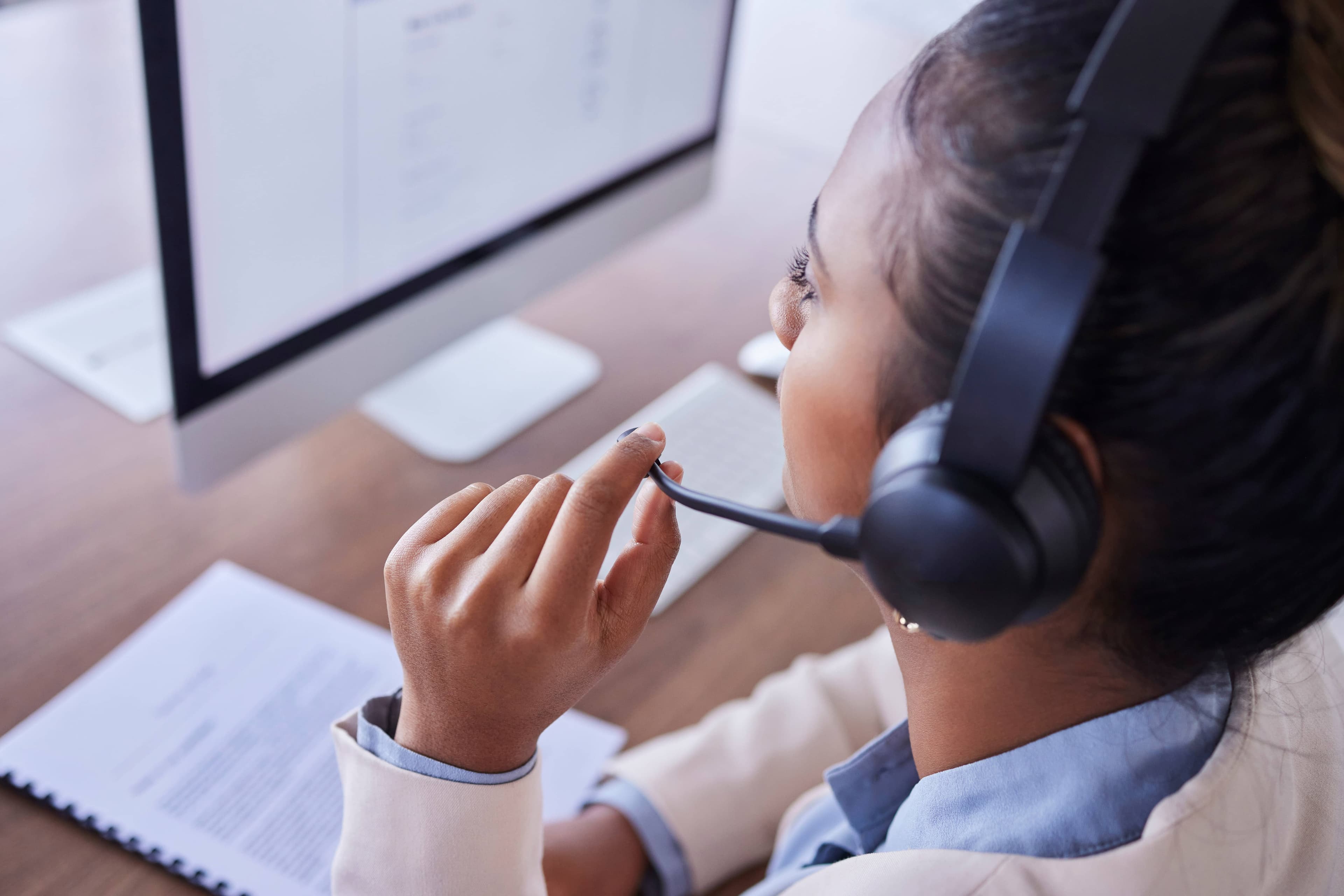 Woman talking into a headset