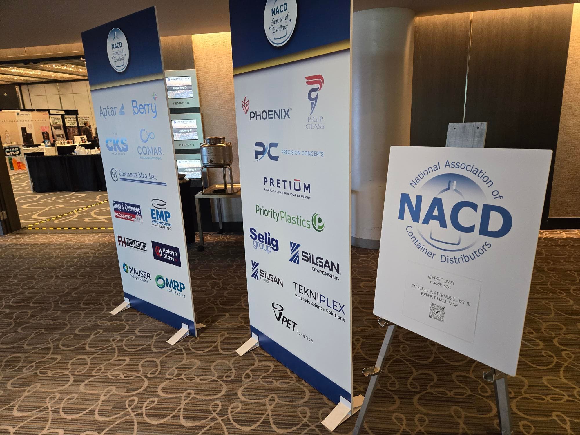 cardboard signage for NACD West Coast Expo 2024 highlighting key brands that are members of the NACD.