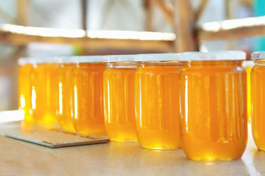 Honey packaged in glass jars