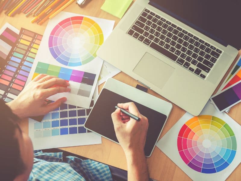 graphic designer working on branding for custom packaging