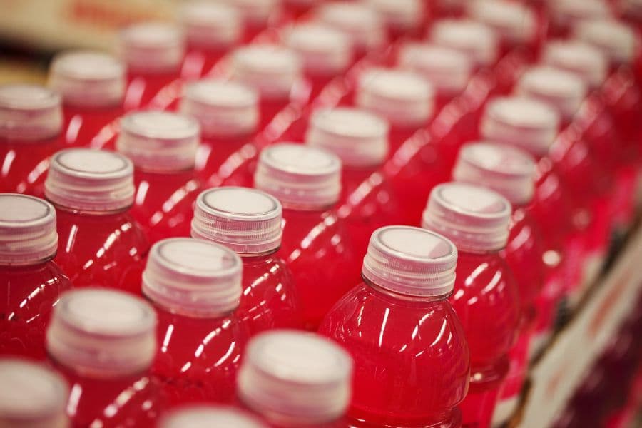 recyclable plastic beverage bottles made from post-consumer recycled (PCR) materials