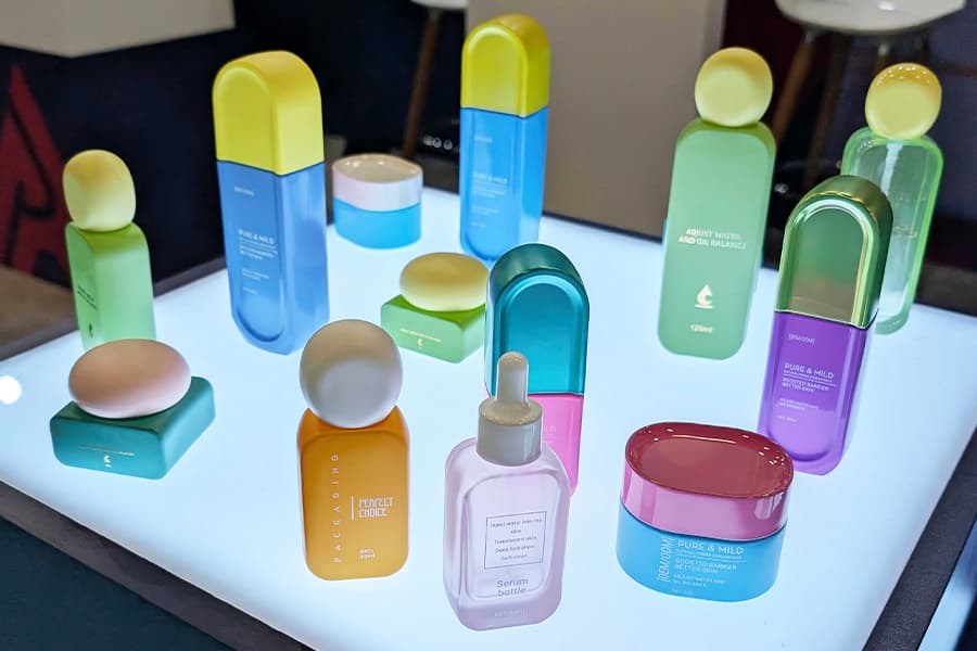 Custom packaging shapes with rounded edges seen at Cosmoprof 2025