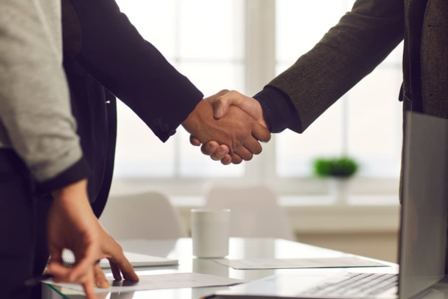 business partners shaking hands