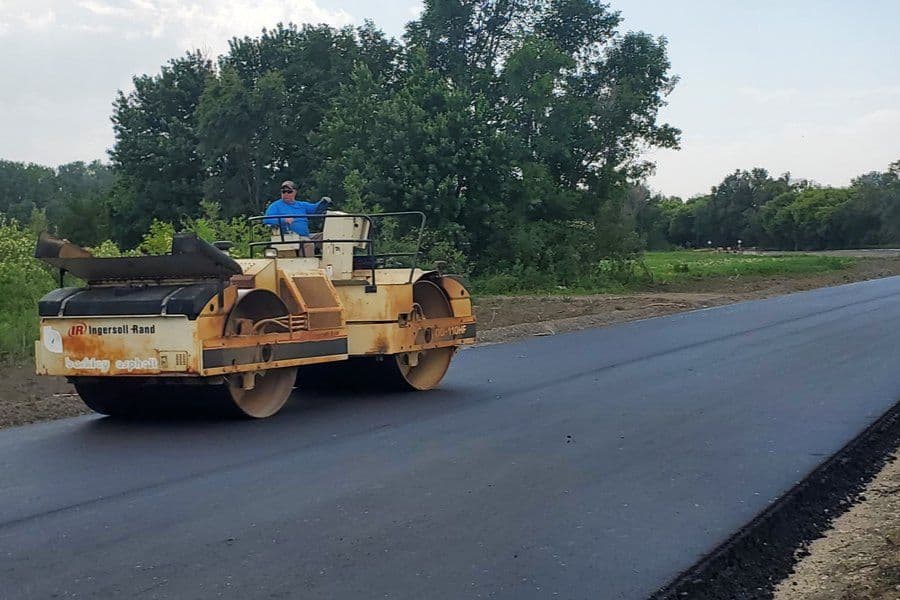 Road in Nebraska being pave with plasticized asphalt for plastic waste diversion
