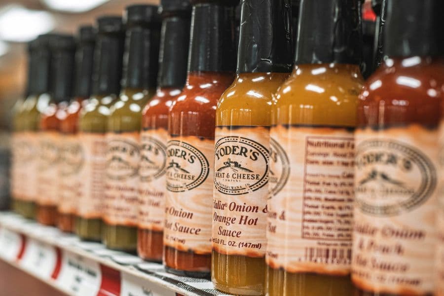 condiment bottles on a retail shelf