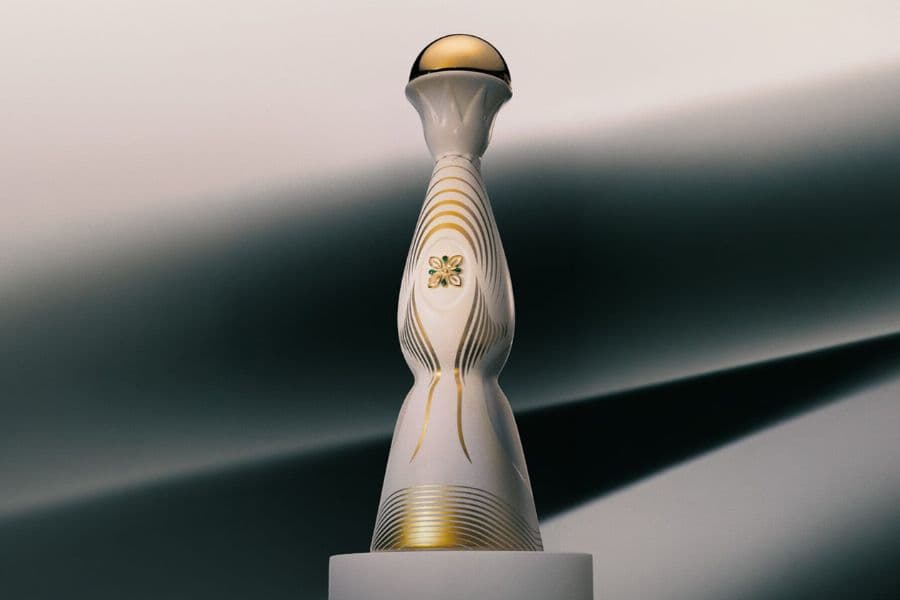 Limited edition Clase Azul ceramic tequila bottle with gold detailing and green stones in logo design for the 2026 FIFA World Cup